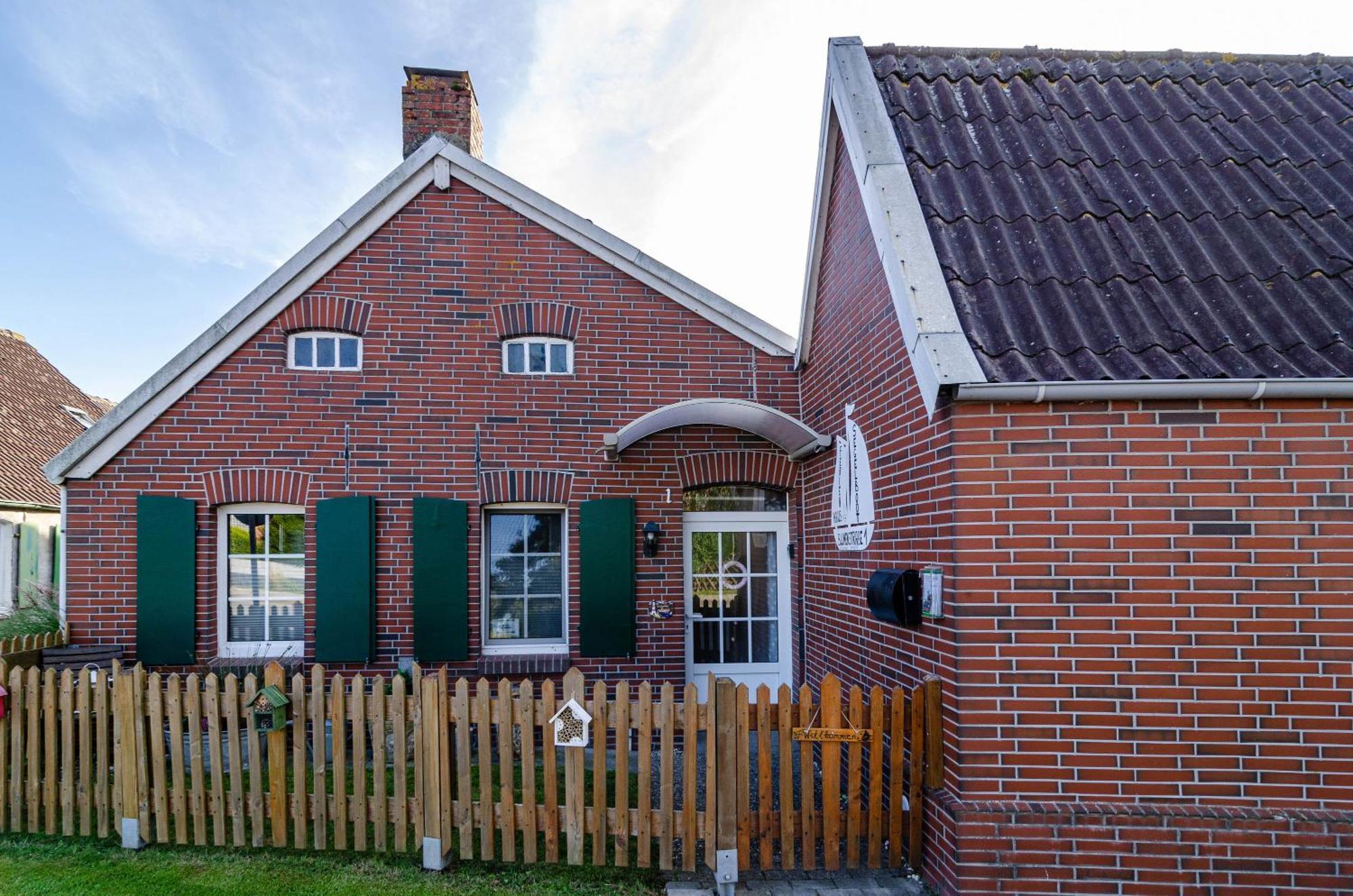 Krummhörn Ferienhaus Segelboot מראה חיצוני תמונה